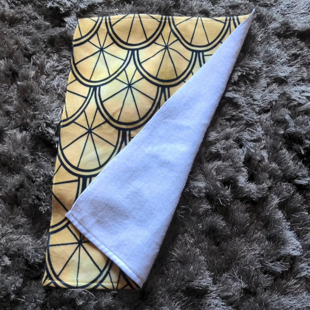 Two art deco microfiber hand towels